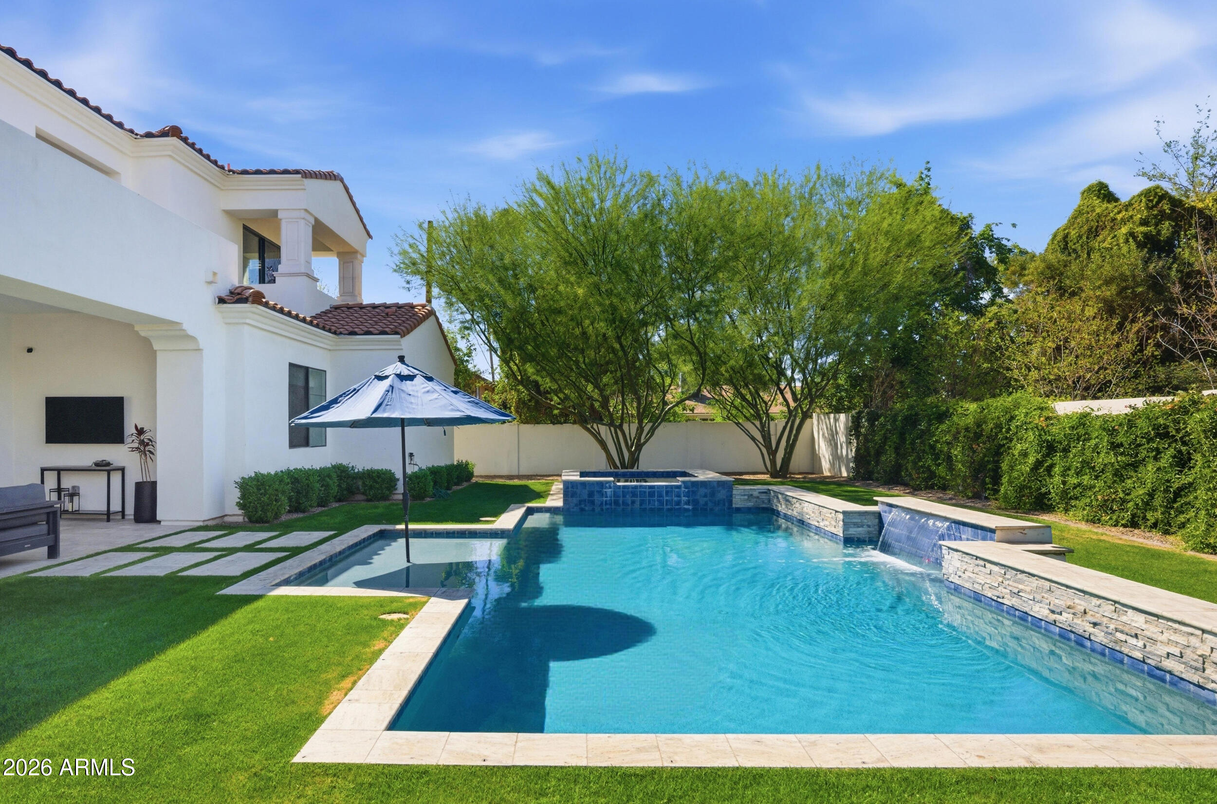 40 West Frier Drive Phoenix, AZ 85021 - Photo 45 of 54 a view of a swimming pool with a yard