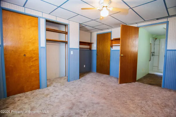 an empty room with a bathroom