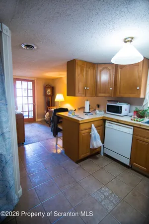 a kitchen with a cabinets counter top space a sink and appliances