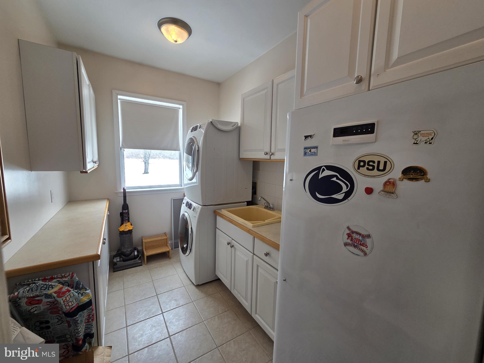 1028 Blackbird Landing Road Townsend, DE 19734 - Photo 15 of 30 a kitchen with a refrigerator and a stove