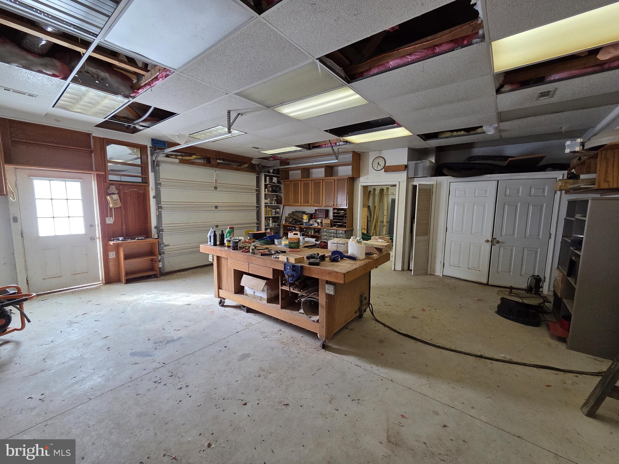 1028 Blackbird Landing Road Townsend, DE 19734 - Photo 19 of 30 a room with gym equipment and a large window