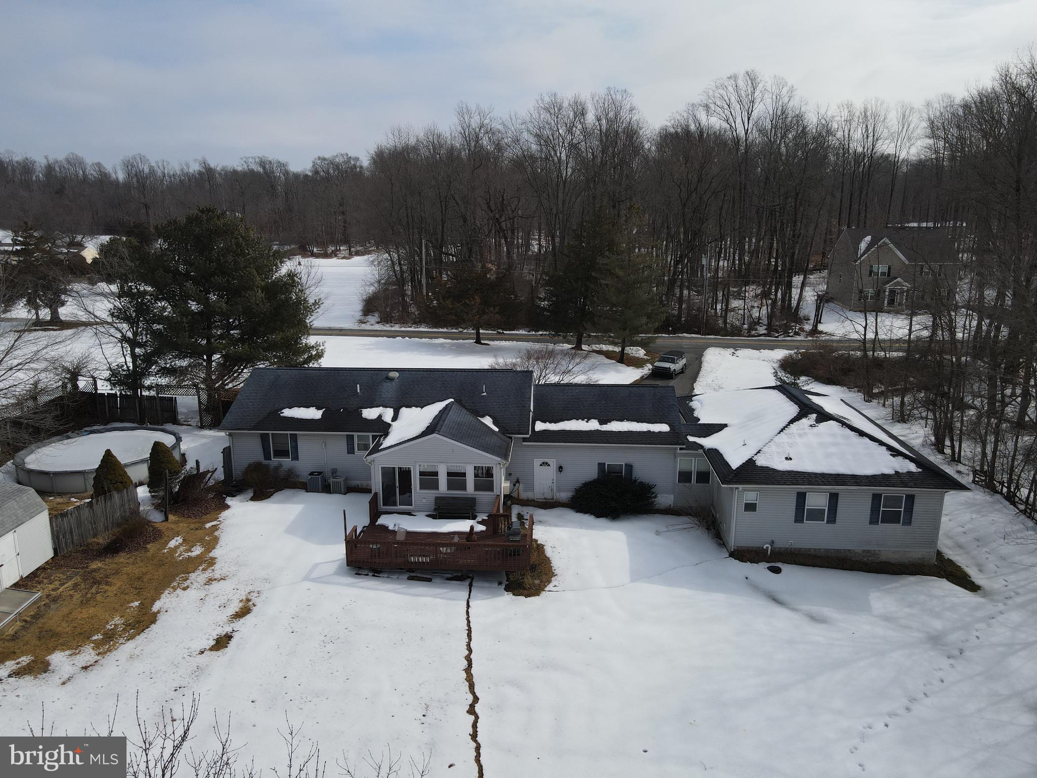 1028 Blackbird Landing Road Townsend, DE 19734 - Photo 22 of 30 a view of a patio with couches and a fire pit