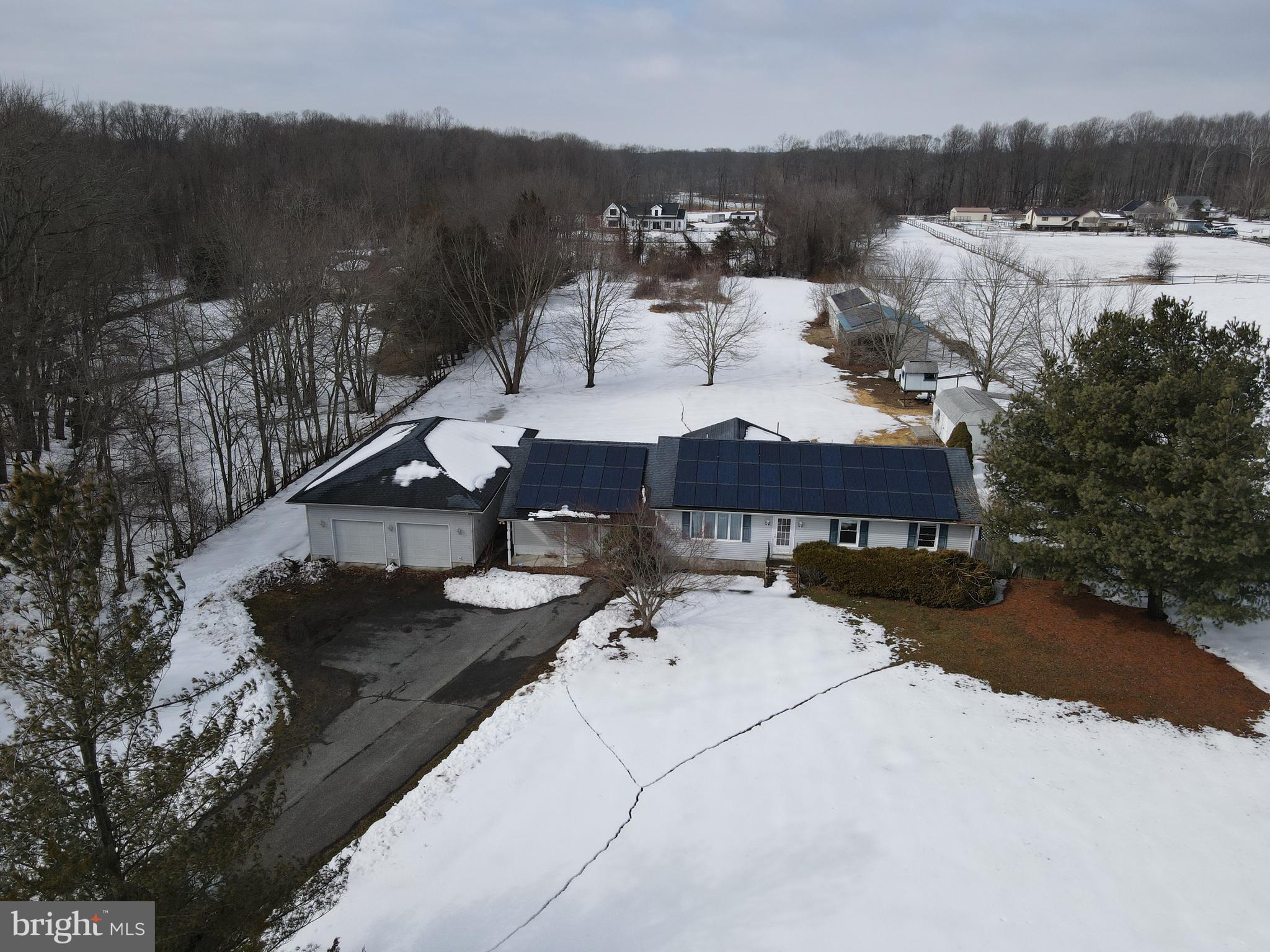 1028 Blackbird Landing Road Townsend, DE 19734 - Photo 28 of 30 a view of a house with yard and mountain view in back