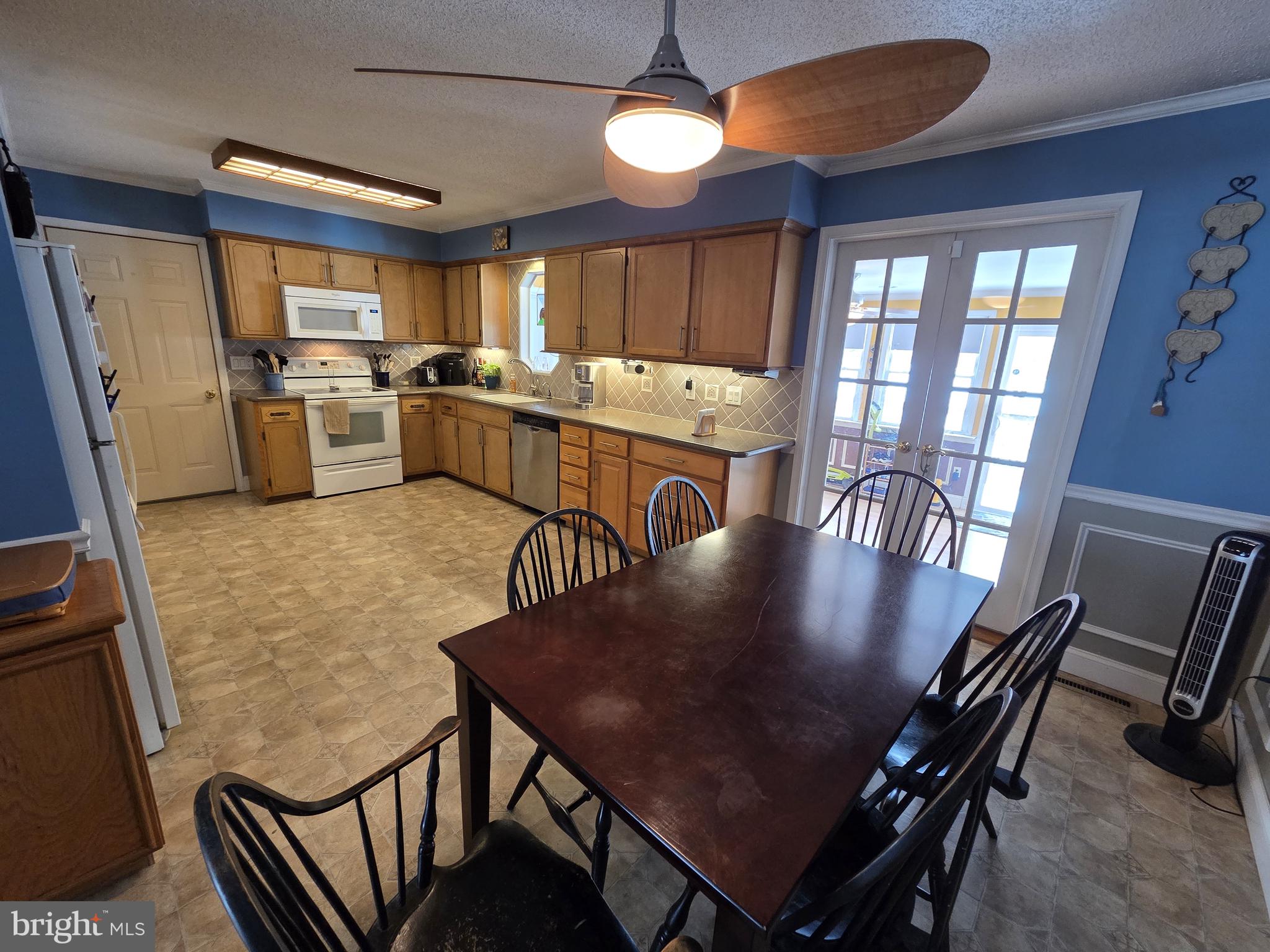 1028 Blackbird Landing Road Townsend, DE 19734 - Photo 4 of 30 a view of a dining room with furniture window and wooden floor