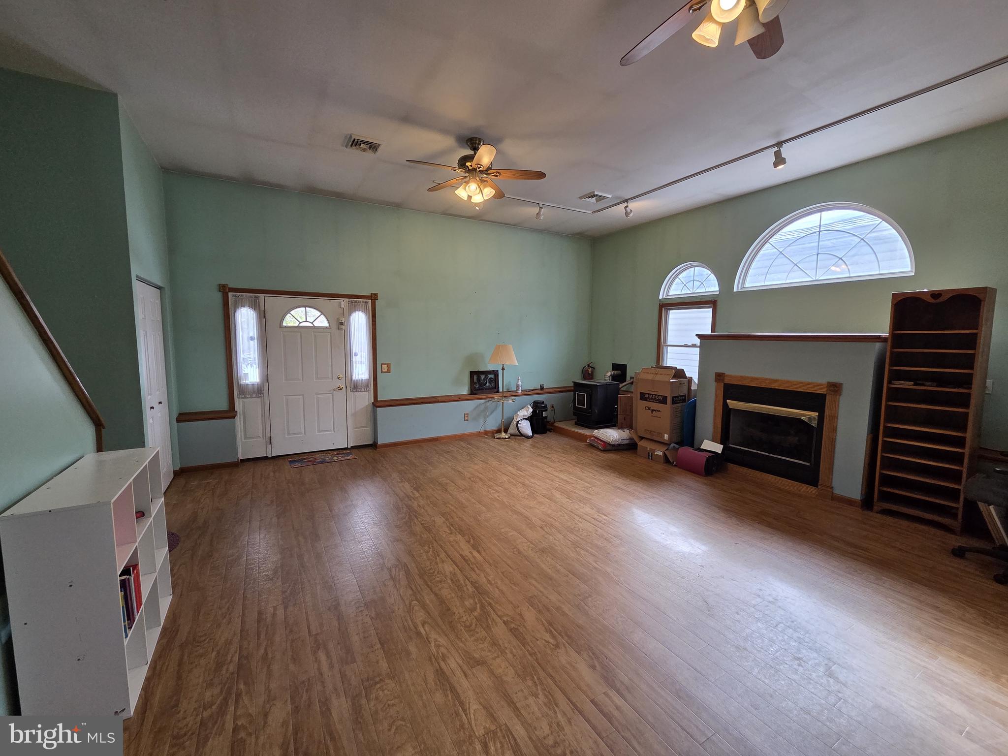 1028 Blackbird Landing Road Townsend, DE 19734 - Photo 5 of 30 a view of a livingroom with furniture and a fireplace