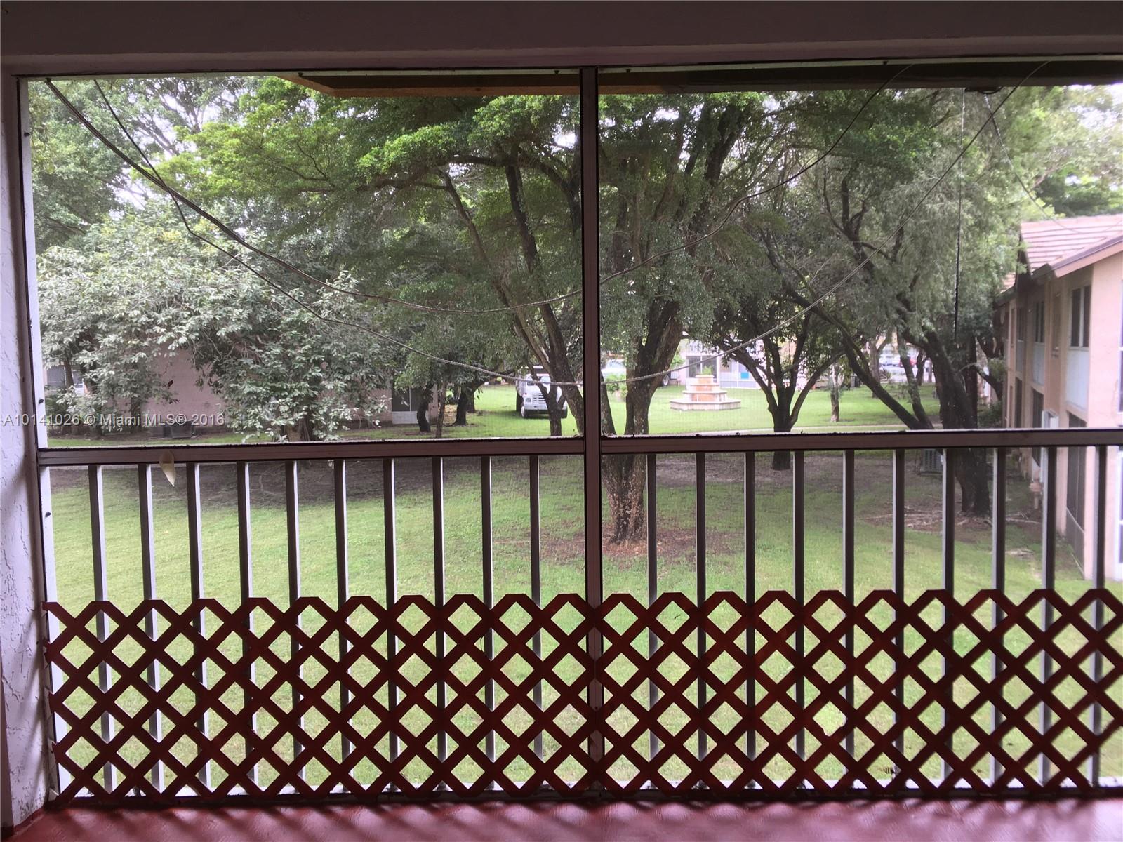 13946 Southwest 90th Terrace, Unit 13946 Miami, FL 33186 - Photo 13 of 16 a view of a black gate
