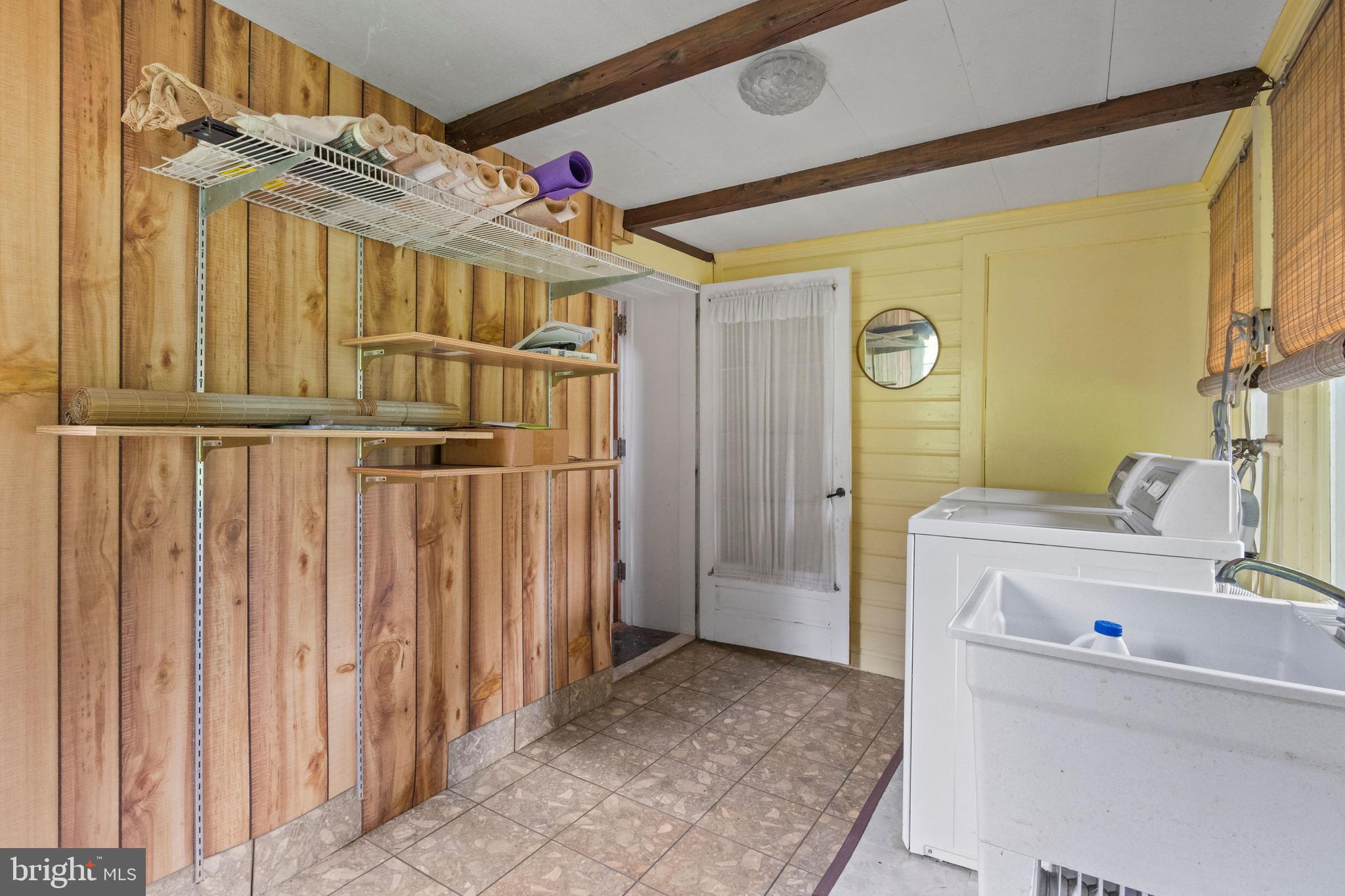 564 Blandon Road Fleetwood, PA 19522 - Photo 16 of 45 a view of storage and utility room with a sink