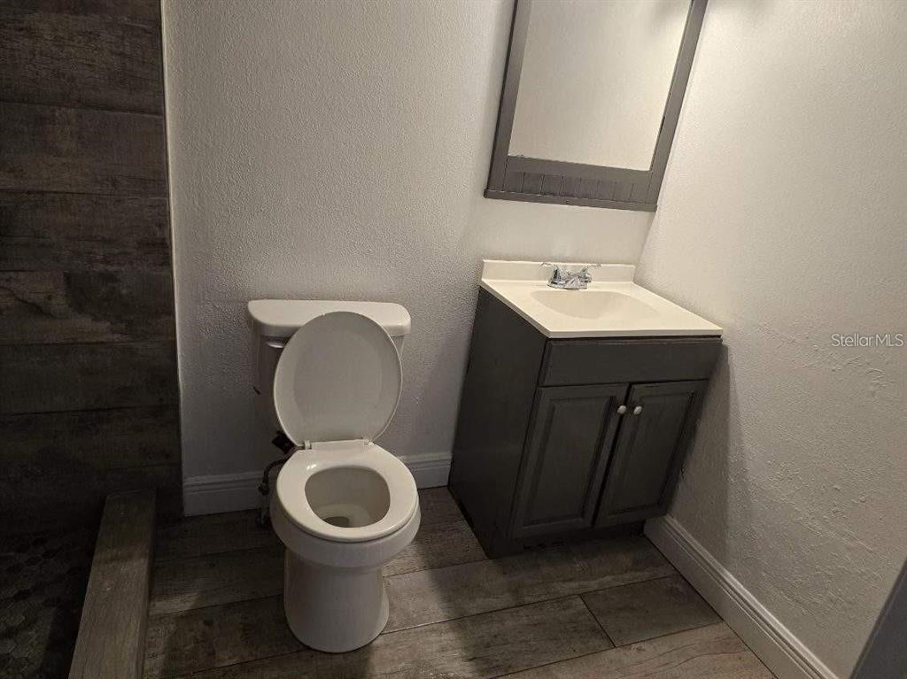 800 North Fiske Boulevard, Unit 714 Cocoa, FL 32922 - Photo 5 of 7 a bathroom with a toilet and a sink