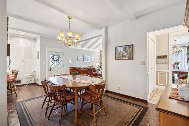 a kitchen with stainless steel appliances granite countertop a stove refrigerator sink and cabinets