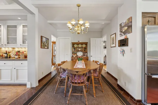 a view of a dining room with furniture
