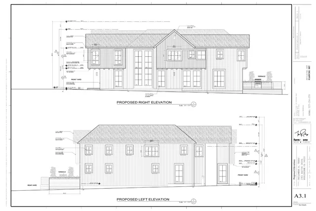 a black and white photo of a living room