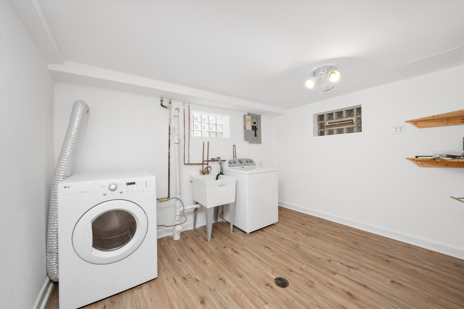 3905 West 81st Place Chicago, IL 60652 - Photo 22 of 32 a view of a room with wooden floor and sink