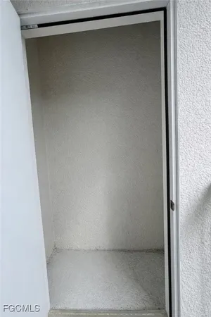 a house with palm tree in front of it