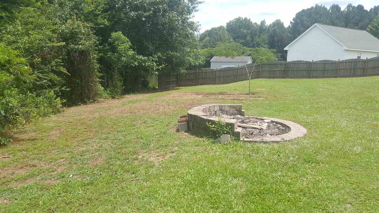 668 Slate Top House Road Clayton, NC 27520 - Photo 8 of 27 Nice Fire Pit! Perfect for the Campfire in You! Fire Pit