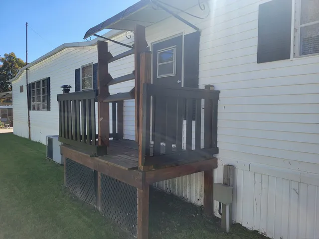 a view of balcony with two chairs