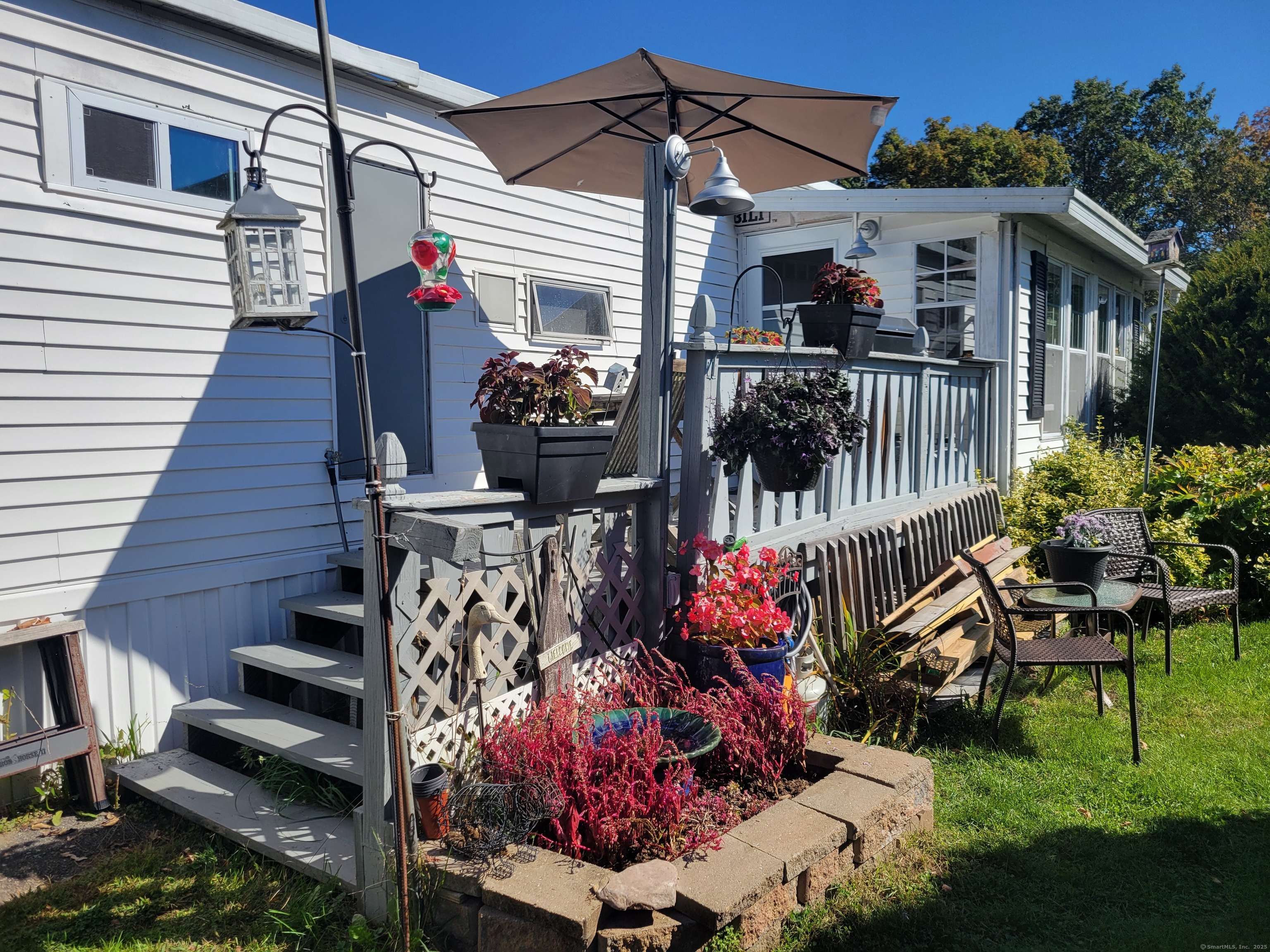 80 Sheldon Road Griswold, CT 06351 - Photo 7 of 25 a view of a house with wooden deck
