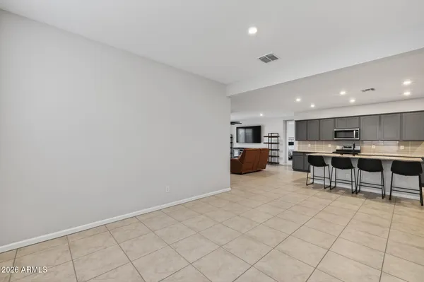 a view of kitchen with furniture and window