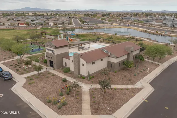an aerial view of a houses with outdoor space