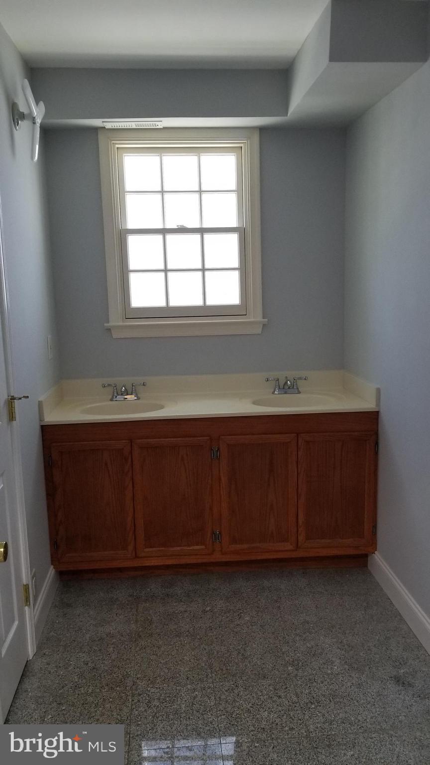 8515 Frederick Road Ellicott City, MD 21043 - Photo 41 of 49 Main level bathroom