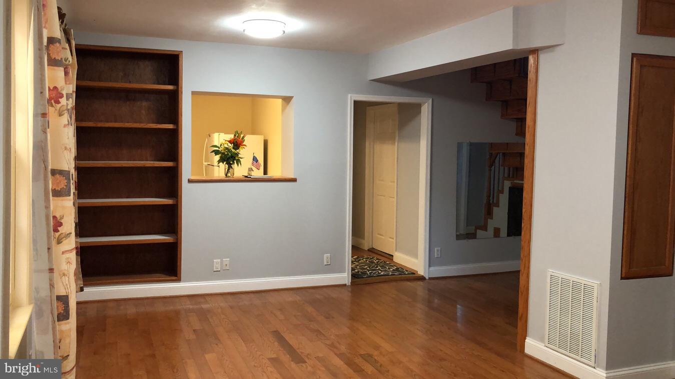 8515 Frederick Road Ellicott City, MD 21043 - Photo 5 of 49 Living/dining room