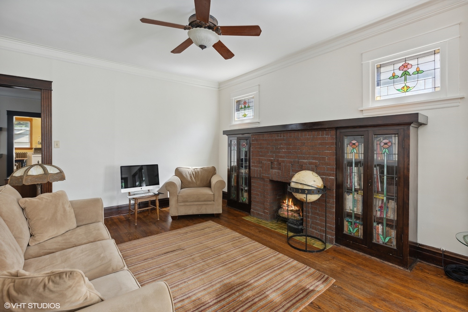 2836 West Eastwood Avenue Chicago, IL 60625 - Photo 4 of 28 a living room with furniture and a fireplace