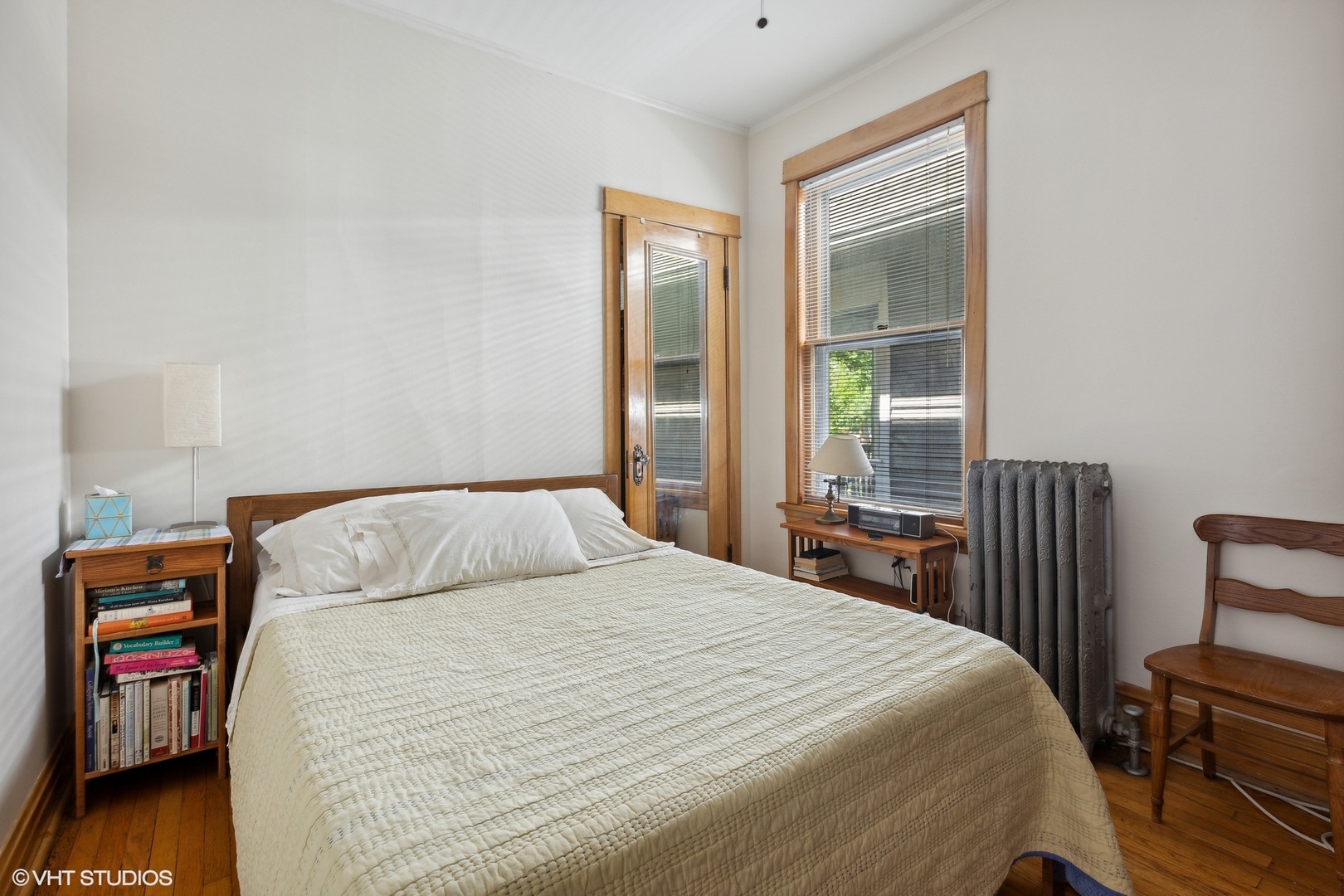 2836 West Eastwood Avenue Chicago, IL 60625 - Photo 6 of 28 a bedroom with a bed and wooden floor