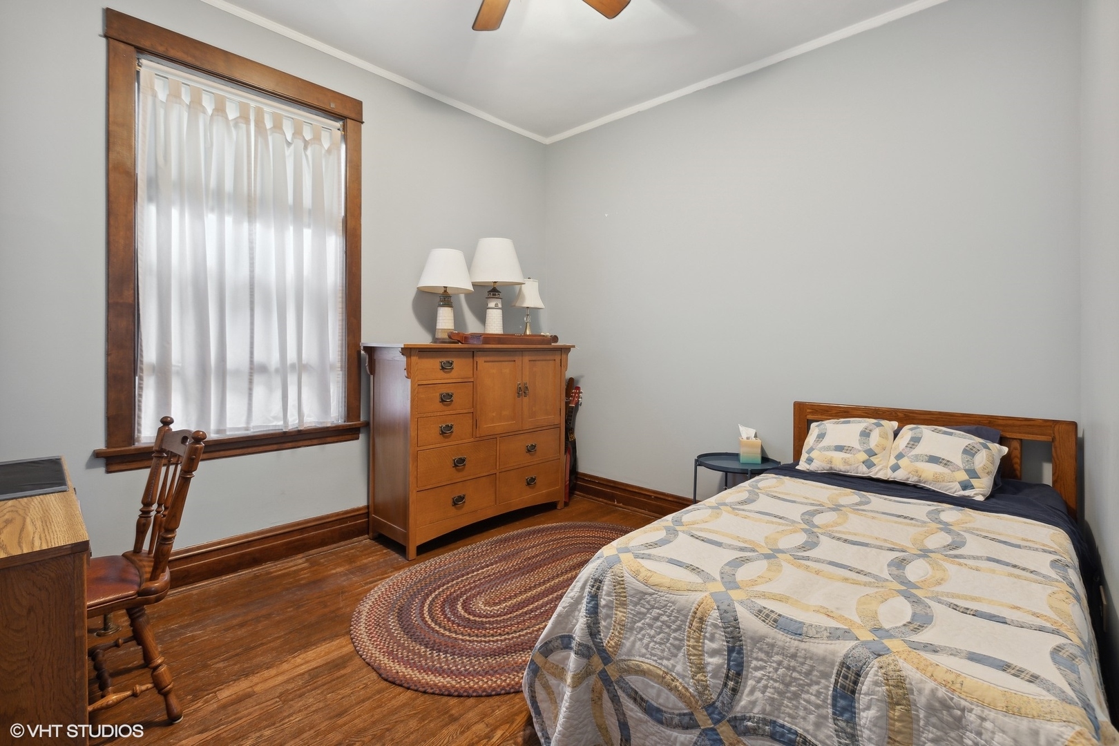 2836 West Eastwood Avenue Chicago, IL 60625 - Photo 8 of 28 a bedroom with a bed and wooden floor