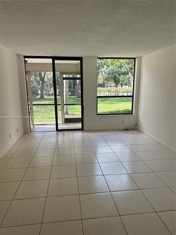 7950 West McNab Road, Unit 106 Tamarac, FL 33321 - Photo 12 of 33 a view of a room with window
