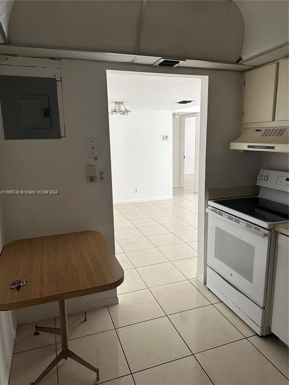 7950 West McNab Road, Unit 106 Tamarac, FL 33321 - Photo 21 of 33 a kitchen with a sink and cabinets