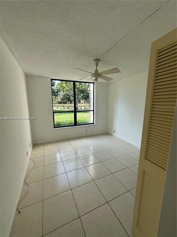 7950 West McNab Road, Unit 106 Tamarac, FL 33321 - Photo 24 of 33 a view of an empty room with a window