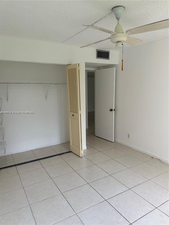 7950 West McNab Road, Unit 106 Tamarac, FL 33321 - Photo 26 of 33 a view of an empty room