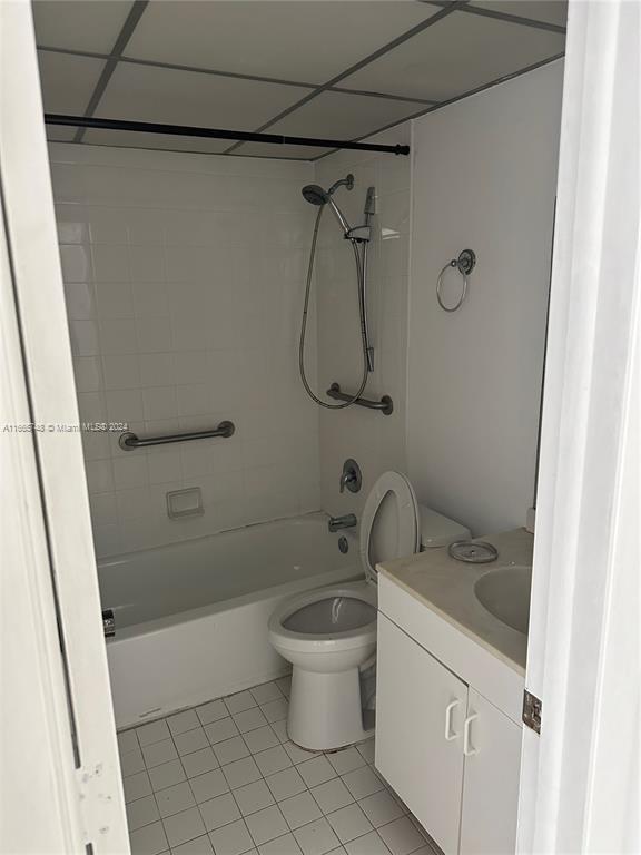 7950 West McNab Road, Unit 106 Tamarac, FL 33321 - Photo 28 of 33 a bathroom with a sink a toilet and shower