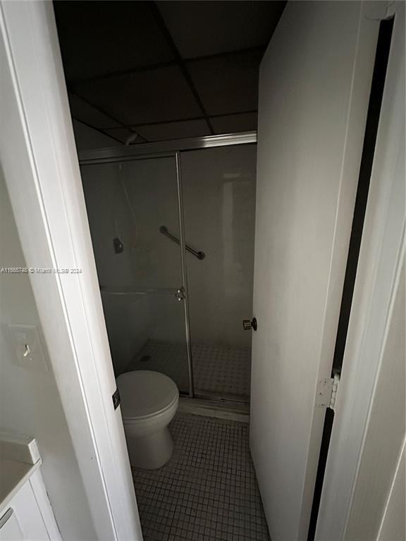 7950 West McNab Road, Unit 106 Tamarac, FL 33321 - Photo 9 of 33 a bathroom with a toilet and a shower