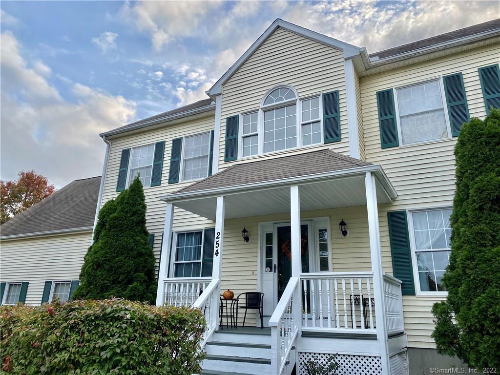 254 Brewster Road Milford, CT 06460 - Photo 1 of 1 a view of a house with a small yard and plants
