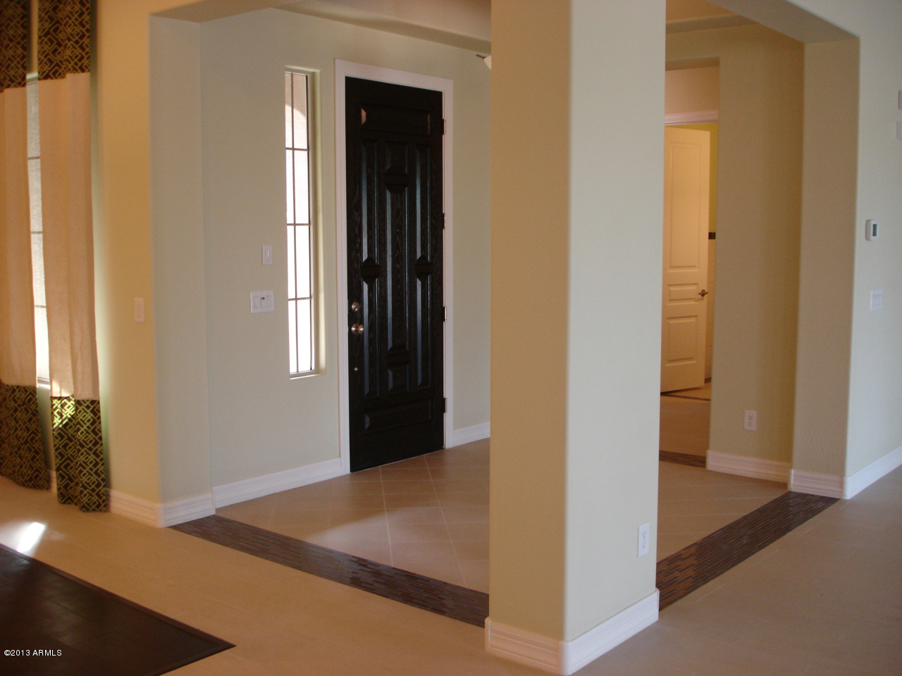 16042 West Berkeley Road Goodyear, AZ 85395 - Photo 21 of 72 Front Door with Tile