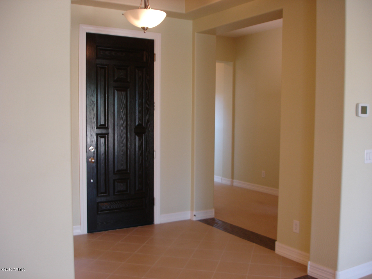 16042 West Berkeley Road Goodyear, AZ 85395 - Photo 22 of 72 Front Door & View to Hallway