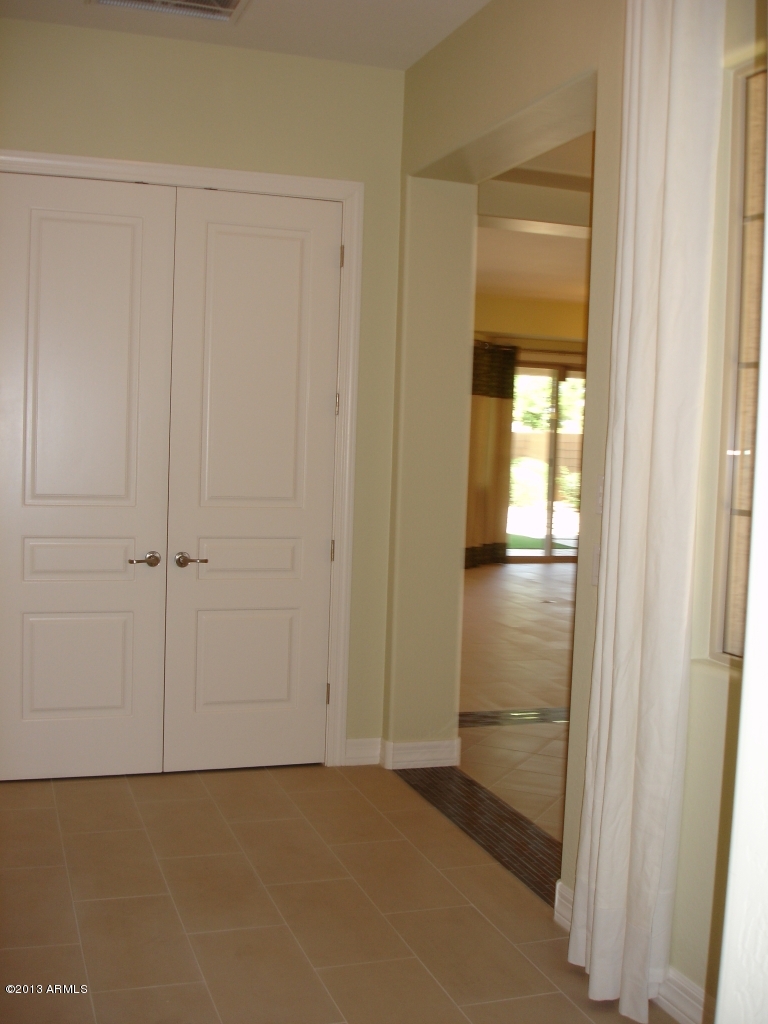 16042 West Berkeley Road Goodyear, AZ 85395 - Photo 28 of 72 Hallway to Family Room