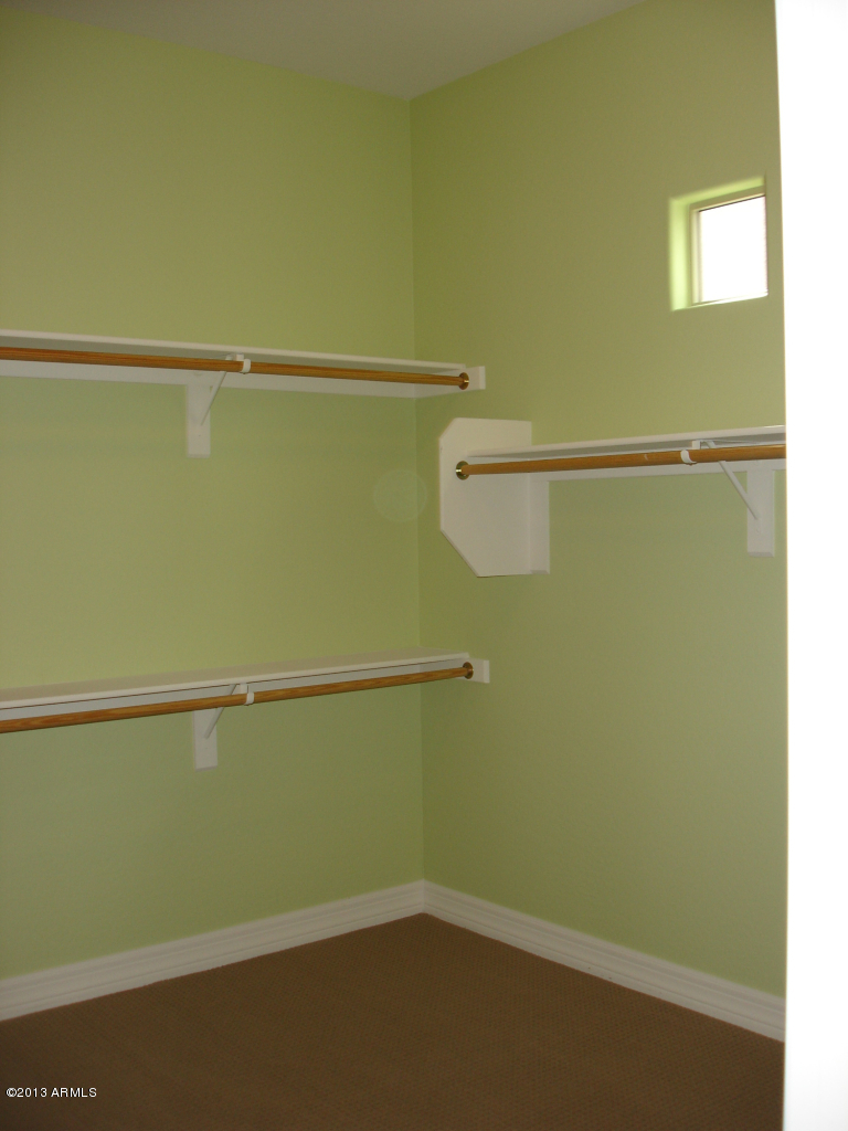16042 West Berkeley Road Goodyear, AZ 85395 - Photo 49 of 72 Master Bedroom Closet