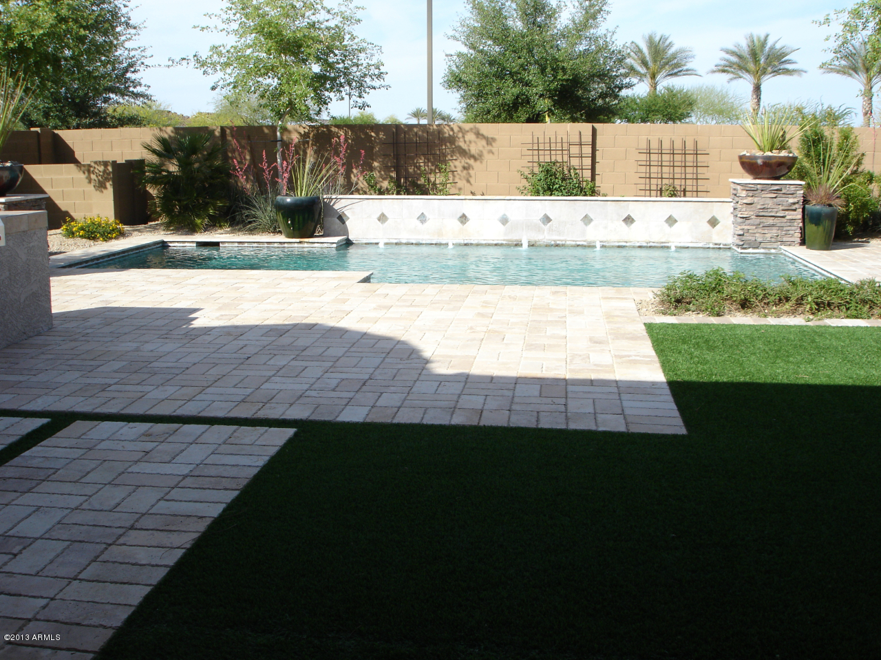 16042 West Berkeley Road Goodyear, AZ 85395 - Photo 65 of 72 Backyard Pool/Landscaping