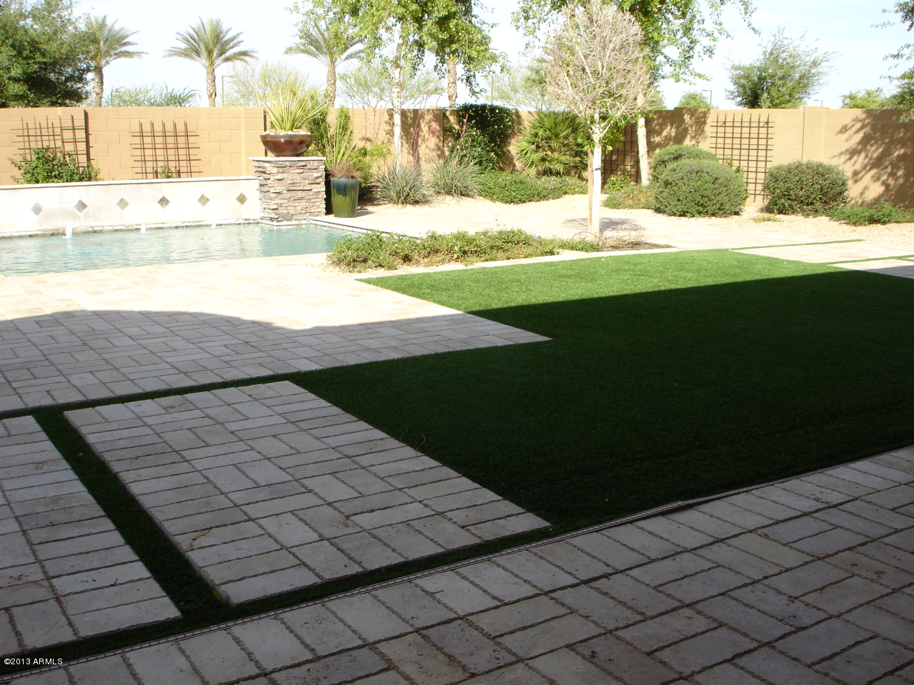 16042 West Berkeley Road Goodyear, AZ 85395 - Photo 72 of 72 Backyard Pool/Landscape 3