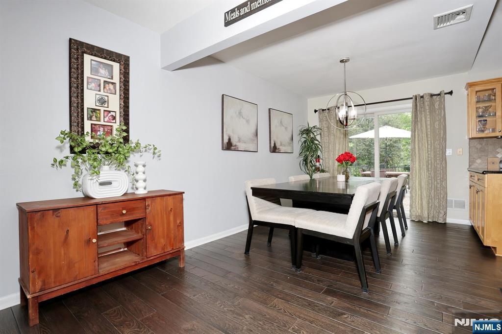 30 Brookfield Road Dumont, NJ 07628 - Photo 8 of 50 a view of a dining room with furniture window and wooden floor