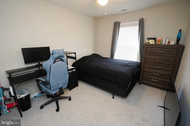 a view of a workspace with furniture