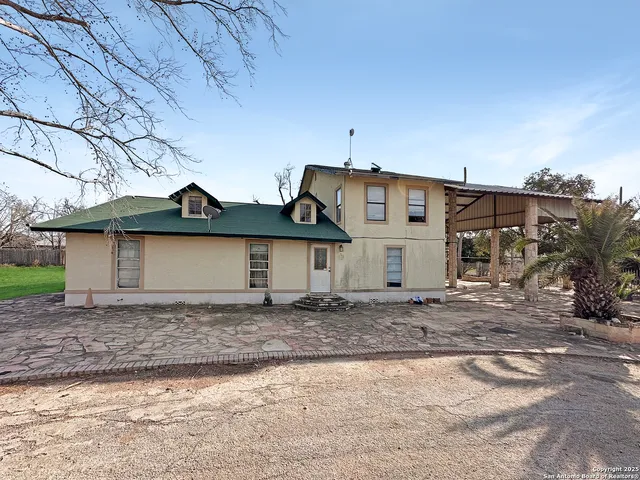 a view of a balcony with wooden floor