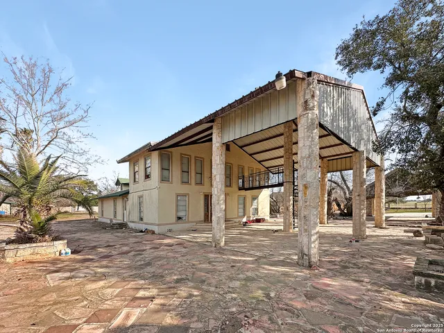 a view of a balcony with wooden floor