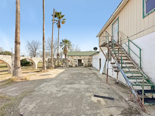 a room with furniture and a rug