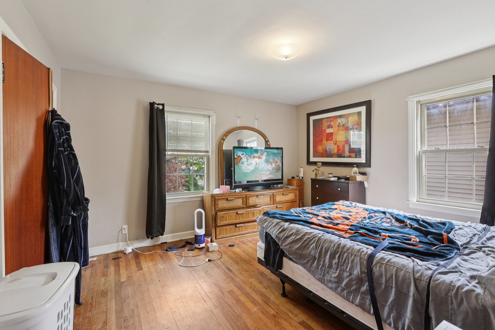 136 Hubbard Court Wauconda, IL 60084 - Photo 16 of 35 a bedroom with a bed and a dresser with mirror