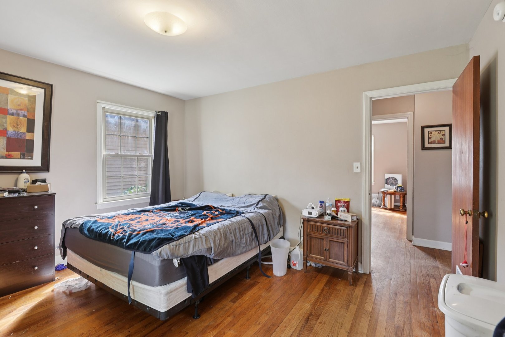 136 Hubbard Court Wauconda, IL 60084 - Photo 17 of 35 a bedroom with a bed and wooden floor