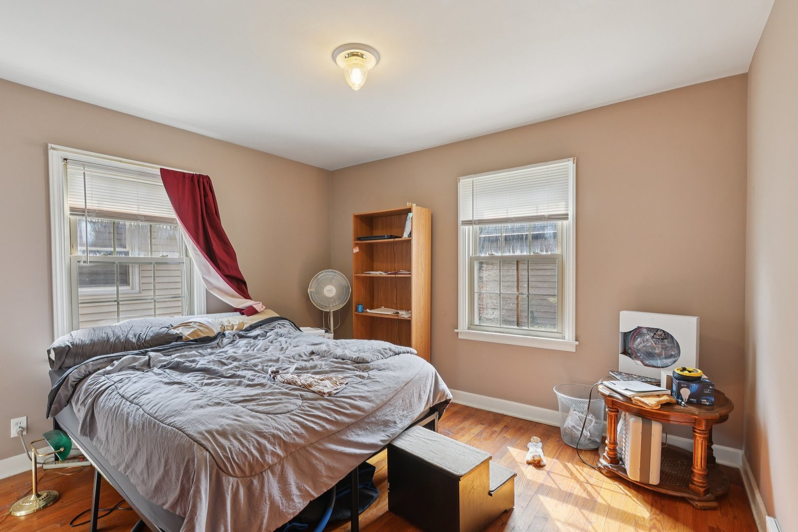 136 Hubbard Court Wauconda, IL 60084 - Photo 20 of 35 a bedroom with a bed and wooden floor