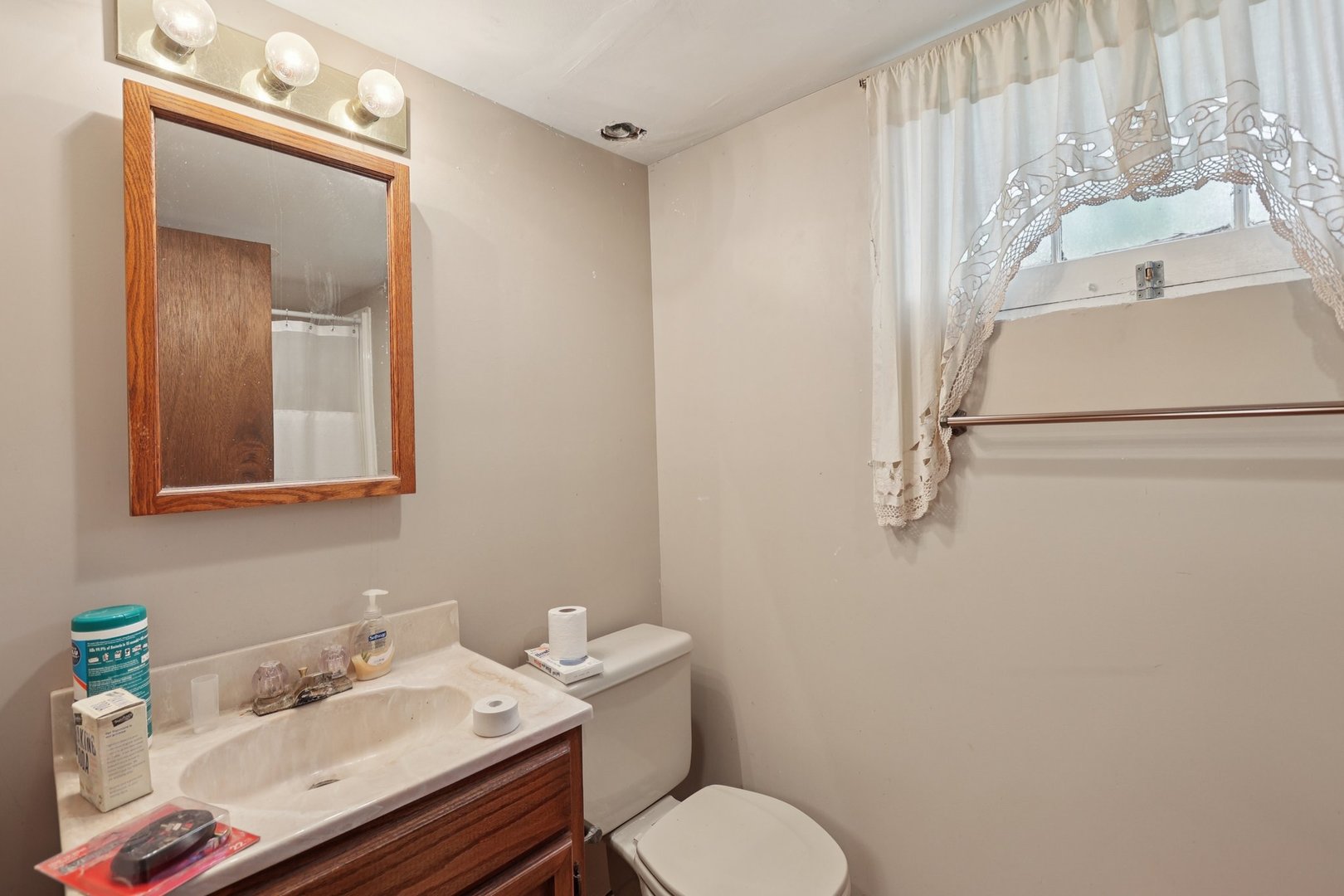 136 Hubbard Court Wauconda, IL 60084 - Photo 23 of 35 a bathroom with a sink toilet and vanity