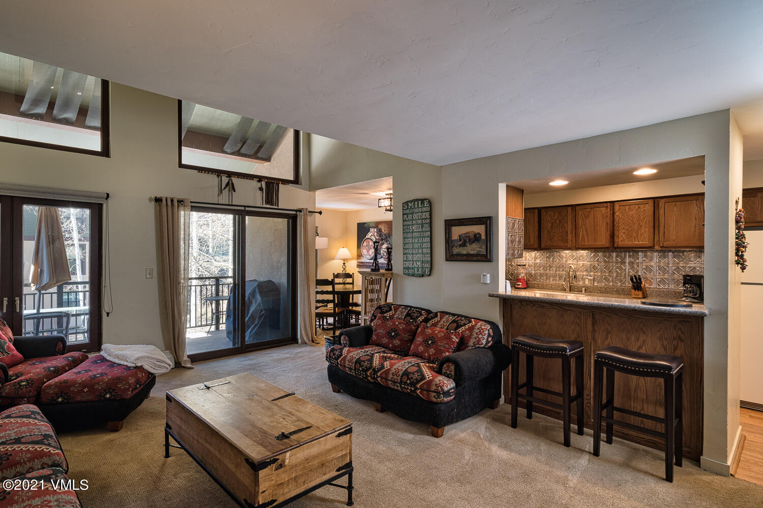 993 Lions Ridge Loop, Unit 331 Vail, CO 81657 - Photo 3 of 20 a living room with furniture and a table